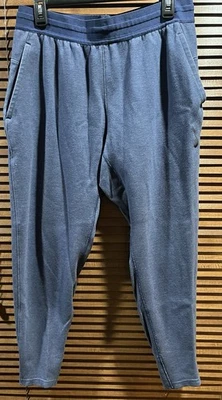 Calça jogger masculina Nike Dri-Fit ioga tamanho médio azul CZ2208-068 - Imagem 1 de 4