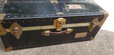 Vintage Black And Brass Steamer Trunk. Good condition. 17x12x31. Original Cover