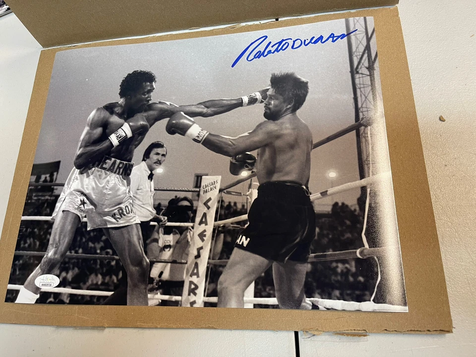 ROBERTO DURAN SIGNED AUTOGRAPHED 11x14 PHOTO w/Tommy Hearns  JSA B/W Pose - Image 1 of 1