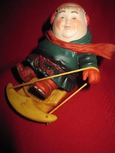 Vintage Dept 56 Christmas Ornament Whimsical Boy Riding a Sled - Picture 1 of 12