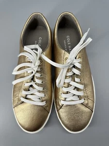 New With Box COLE HAAN GRAND CROSSCOURT Ladies Gold Leather  Sneakers SZ 6.5 - Picture 1 of 9