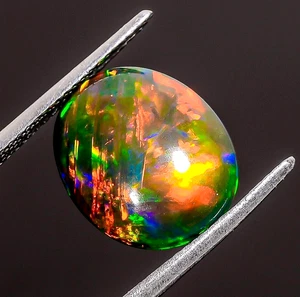 Natural Black Ethiopian Opal Loose Gemstone Oval Shape Cabs 3.45 Ct 13X11X4 mm - Picture 1 of 4