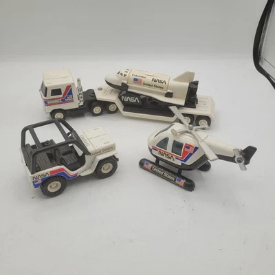 Camión espacial Buddy L Corp 1980 NASA de colección, remolque, transbordador, helicóptero y jeep Foto 1 de 4
