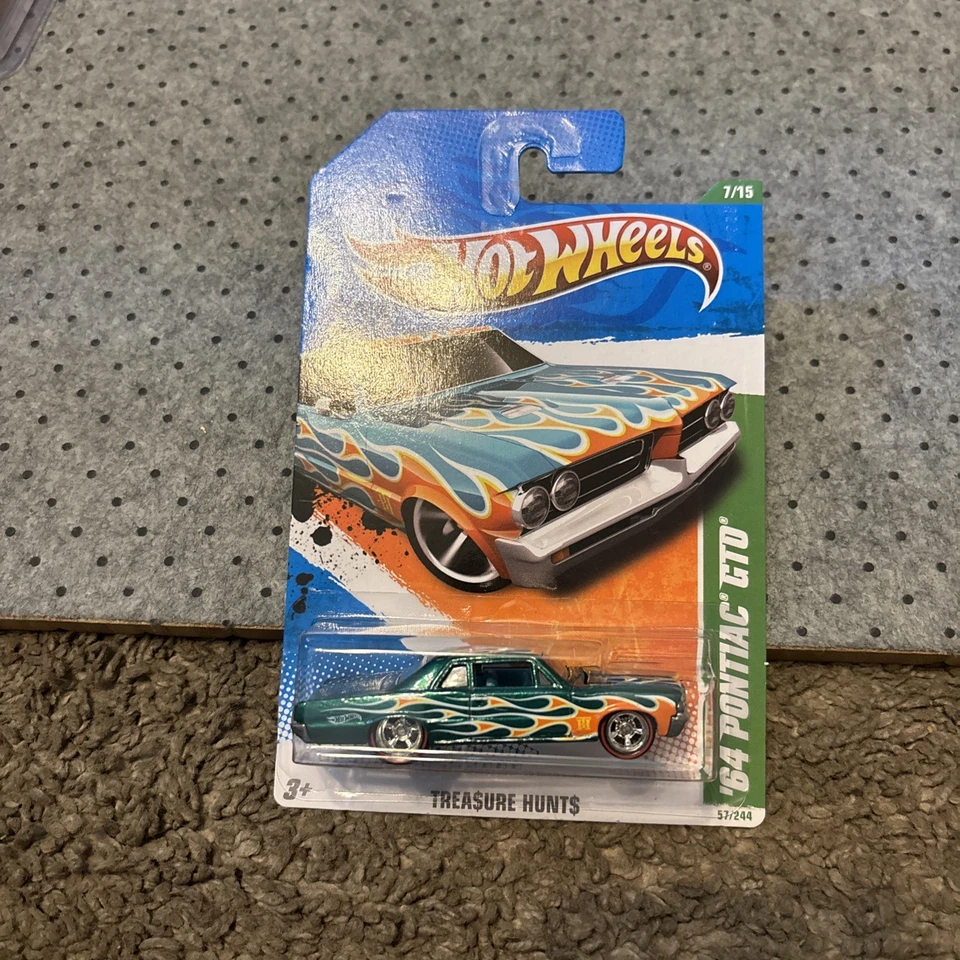 VHTF Hot Wheels 2011 '64 PONTIAC GTO Aqua с пламенем ОХОТА ЗА СОКРОВИЩАМИ! Небольшие вмятины - Изображение 1 из 4