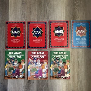 7 VINTAGE 1980s Atari 2600 Video Game Cartridges Catalogs 3 DIFFERENT - Picture 1 of 5