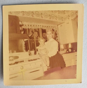 Pretty Blond Woman w/ Child Peeping Tom Vintage 1950's Kitchen Snapshot PHOTO - Picture 1 of 3