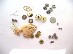 ENICAR 1145,1146 ASSORTED SPARE WATCH MOVEMENT PARTS