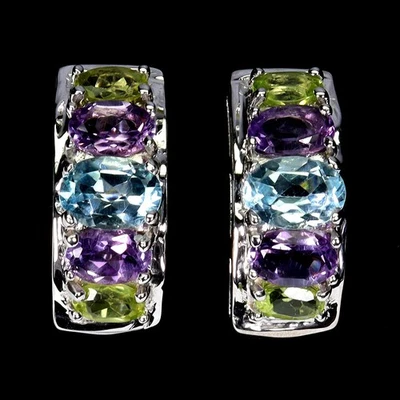 Pendientes de plata de ley 925 ovalados topacio azul cielo 7x5 mm peridoto piedras preciosas joyería Foto 1 de 4