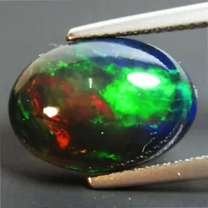 4.14Ct Natural Color Play Ethiopian Black Opal Oval Shape Cabochon Loose Gem VOD - Picture 1 of 5