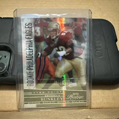2006 Playoff Prestige Xtra Points Green #165 Brodrick Bunkley /50 - Image 1 of 2