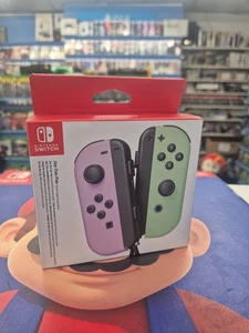 Nintendo Switch Joy-Con (L)/(R) - Pastel Purple/Pastell Green - Neu - Bild 1 von 3