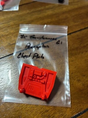 1985 Transformers G1 - Perceptor, chest plate w/screws - Image 1 of 2