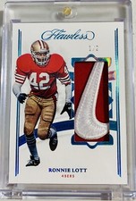 Ronnie Lott 1/2 Nike Swoosh Patch 2022-23 Panini Flawless Football Card