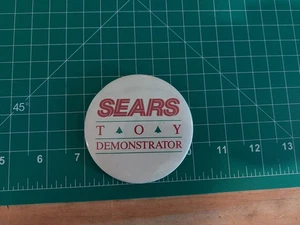 Prendedor de botón demostrador juguete Sears vintage - Imagen 1 de 2