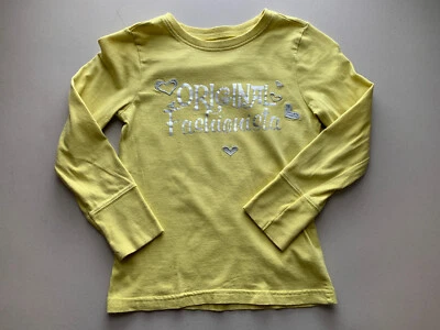 Camiseta Crazy 8 Niña Amarillo Mostaza "Original Fashionista" Manga Larga, Talla M  Foto 1 de 4