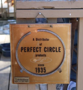 RARE ~1960s PERFECT CIRCLE PISTON RINGS Old Gas Station Distributor Sign w/Ring - Picture 1 of 11