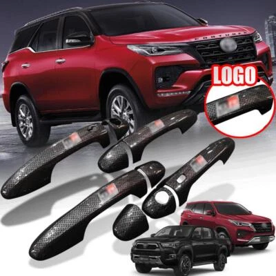 CUBIERTA MANIJA PUERTA GR LOGO PARA TOYOTA FORTUNER HILUX REVO 2015-2022 ESTILO CARBONO Foto 1 de 4
