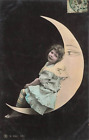 Little Girl Sitting Crescent Moon Man In The Paper Rppc Real Photo Postcard 1906