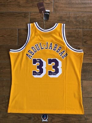 Signed Kareem Abdul-Jabbar Lakers Yellow Jersey Beckett Witness The Captain Insc - Image 1 of 4