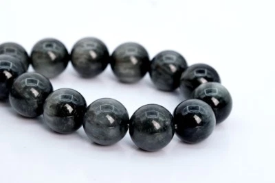 Cuentas sueltas redondas de crisoberilo gris profundo natural genuino de 7 mm AA de 7" Foto 1 de 3