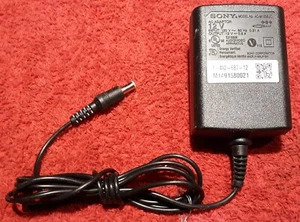 E51)   Genuine SONY AC-DC Power Adapter #AC-M1208UC. Output: DC 12V, 0.8A. - Picture 1 of 2