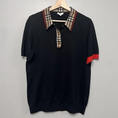 Suéter polo feminino Burberry lã merino malha apertada acabamento quadriculado preto grande - Imagem 1 de 4