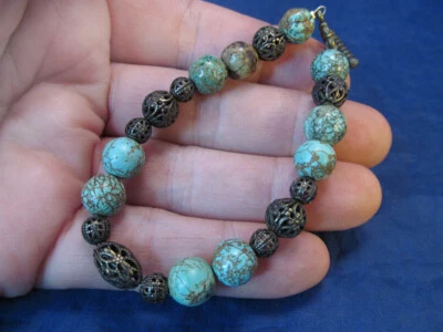 *Pulsera con cuentas de filigrana y turquesa tono bronce cierre de palanca Foto 1 de 4