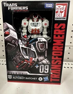 Transformers War Cybertron Autobot Ratchet Actionfigur Gamer Edition 113 - Bild 1 von 5