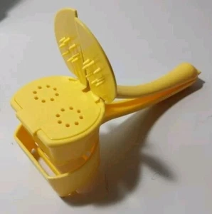 Esparcidor de mantequilla Tupperware Corn Cob Hugger/Mazorn Cob A42 - Imagen 1 de 2