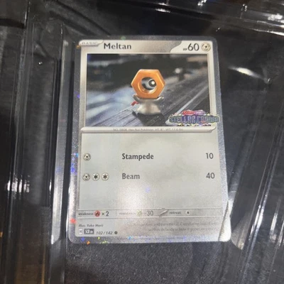 Meltan 102/142 Stellar Crown Stamped Melmetal Ex Box Cosmos Holo Promo Near Mint - Image 1 of 2
