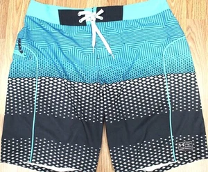 SHORTS DE BAÑO UNDER ARMOUR HEATGEAR SIN FORRO TURQUESA, NEGRO Y GRIS Talla 38 - Imagen 1 de 4