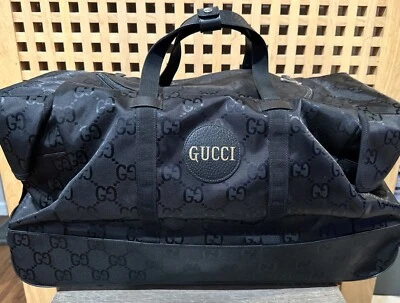 100% AUTHENTIC GUCCI OFF THE GRID LARGE DUFFLE BAG WITH WHEELS MENS COLOR BLACK - Image 1 of 4