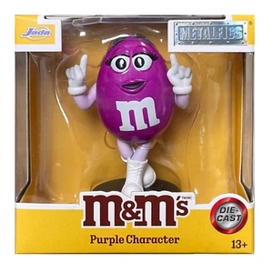 Figura Mars MetalFigs púrpura M&M's chocolate sobre pedestal - totalmente nueva en caja - Imagen 1 de 3