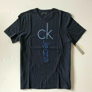 Nuevo con etiquetas Calvin Klein Jeans Para Hombre Estampado CK Mangas Cortas Camiseta Azul Oscuro Heather M - Imagen 1 de 4