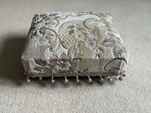 Wheeled fabric footstool in beige pattern material - Picture 1 of 3