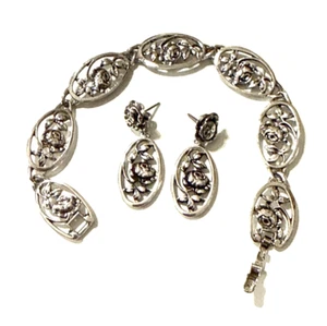 Set orecchini convertibili bracciale fiori Avon ROSAMONDE vintage 1975 tono argento - Foto 1 di 9