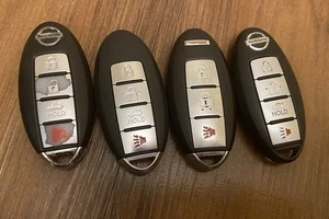 Nissan 3 & 4 Button Remote Key Fob Smart Transmitter Lot USED OEM - Picture 1 of 1