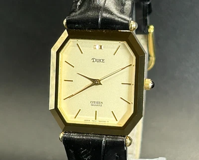 *N COMO NUEVO* Reloj de cuarzo vintage CITIZEN Duke 7933-781058 dorado para hombre de 26 mm de JAPÓN Foto 1 de 4