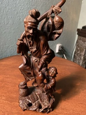 Antiguo pescador chino Foto 1 de 4