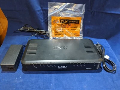 SMC SMCD3G-BIZ EZ Connect DOCSIS 3.0 Commercial 4 Port Cable Modem Gateway - Image 1 of 4