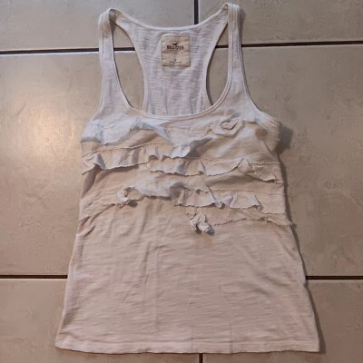 Camisa Hollister para mujer talla pequeña marfil camiseta sin mangas con volantes Foto 1 de 4