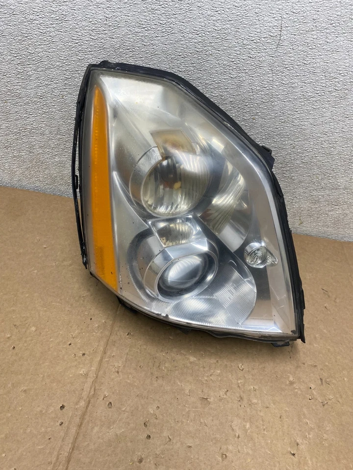 Faro oculto de xenón lateral derecho pasajero Cadillac DTS 2006-2011 OEM U9828 Foto 1 de 4