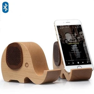 Altavoz Bluetooth 2 en 1 Woodsy Goodsy y soporte para teléfono celular - Imagen 1 de 7
