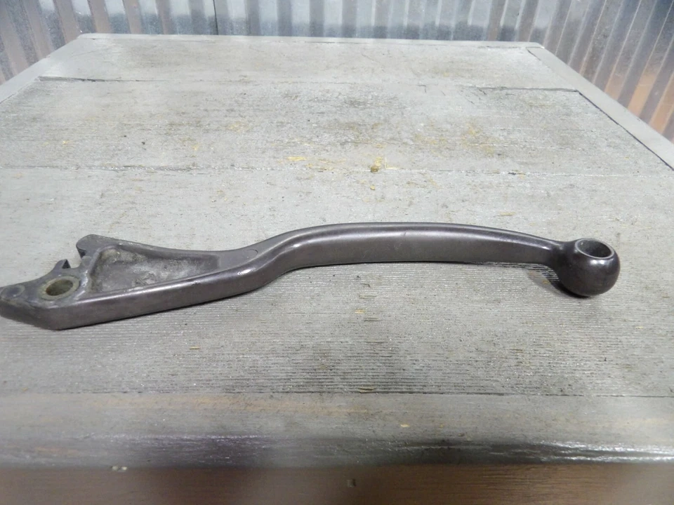 85-86 Suzuki Madura GV700 PALANCA MANIJA FRENO DELANTERO 57420-38B00 Foto 1 de 4