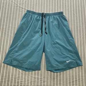 Pantalones cortos de running Nike Dri-Fit 2 en 1 para hombre talla mediana verde azulado mineral - Imagen 1 de 3