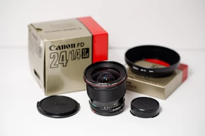 Lente gran angular Canon FD 24mm F1.4L MF. Caja, tapas, capucha TOP COMO NUEVO Foto 1 de 4