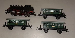 Zeuke Spur 0 Zug Lok T 55 Wechselstrom und drei Personen Wagen - Bild 1 von 5