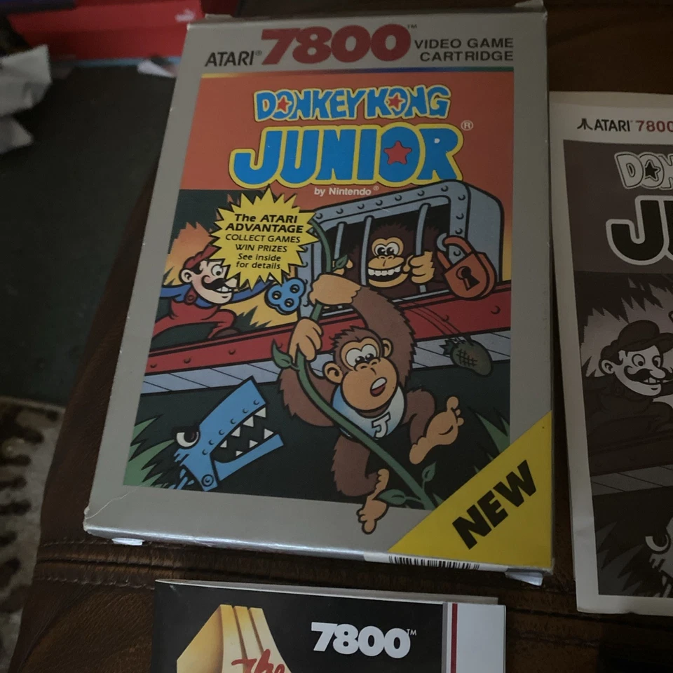 Cartucho de videojuego vintage Atari 7800 Donkey Kong Junior en caja original póster limpio Foto 1 de 4