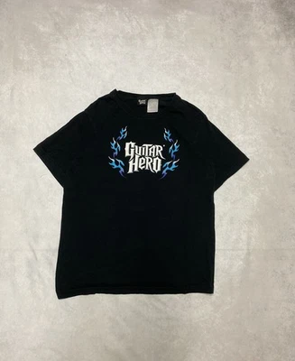 Camiseta Crazy Vintage Streetwear Y2K Guitar Hero 2000’s M Foto 1 de 4