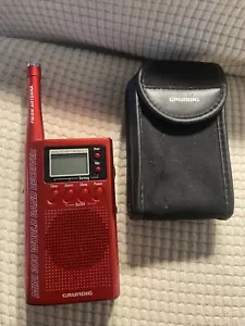 Grundig Mini 300 World Band Receiver Handheld Compact Red SW/FM Radio - Picture 1 of 9